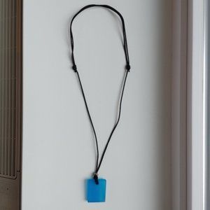 Unique blue pendant necklace with black cord